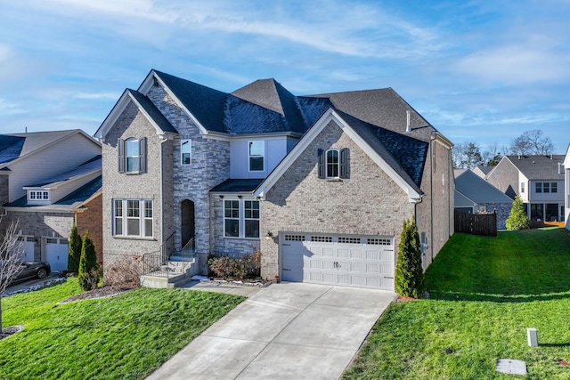 view of front of house with a garage and a front yard