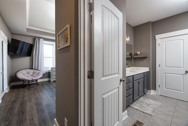 bathroom with vanity and tile patterned flooring