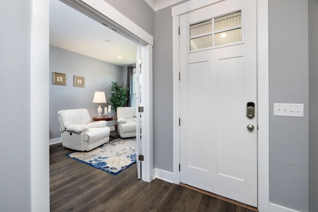 entrance foyer with dark hardwood / wood-style flooring