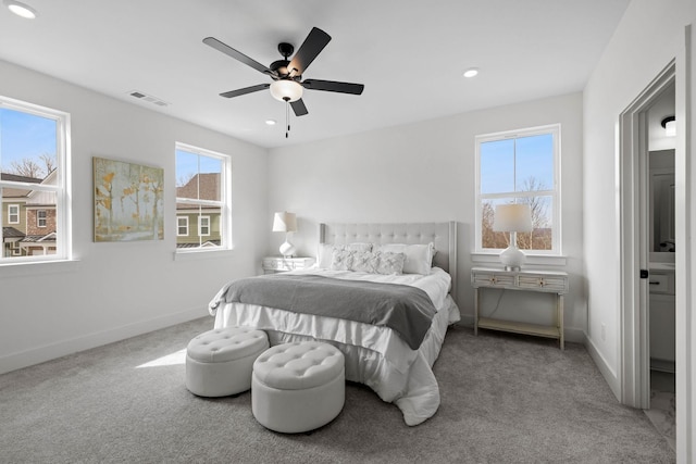 carpeted bedroom with ceiling fan