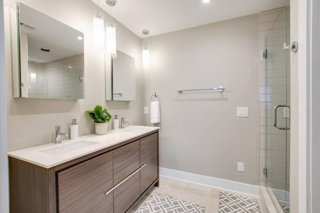 2122 9th Ave N, Nashville, TN 37208 - bathroom with vanity, tile patterned flooring, and a shower with shower door