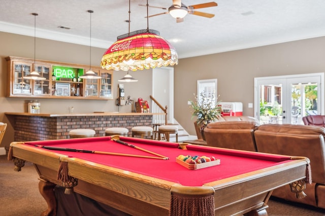 playroom with ornamental molding, carpet floors, ceiling fan, and french doors