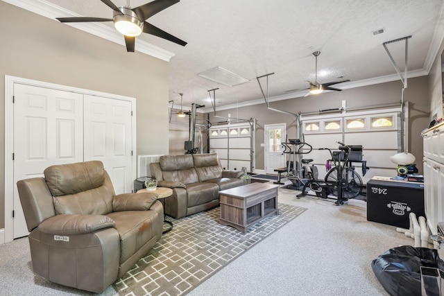 carpeted living room with a textured ceiling, ornamental molding, and ceiling fan