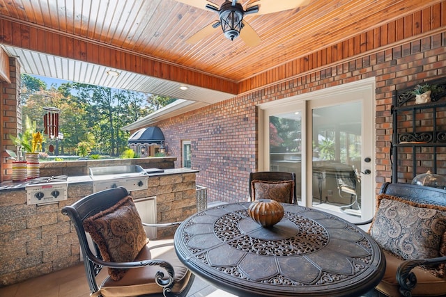 view of patio featuring ceiling fan and area for grilling