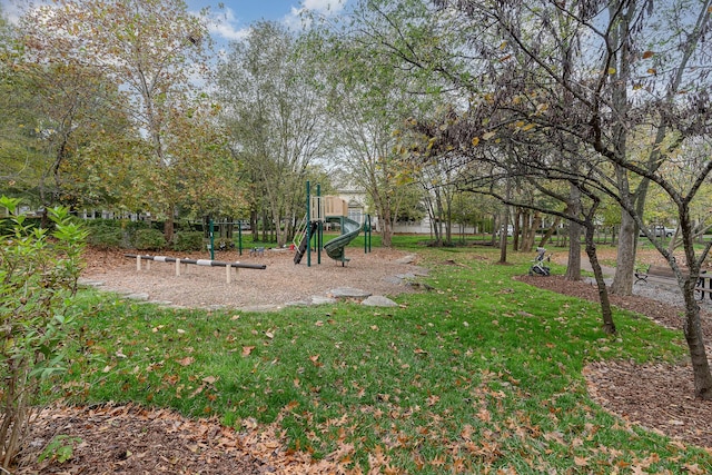 view of jungle gym with a lawn