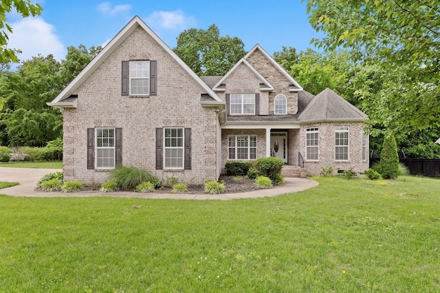 view of front of home with a front yard