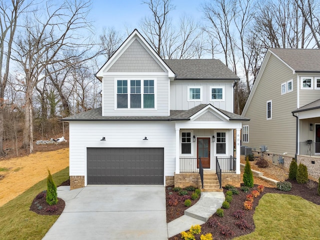 view of front of property with a garage and a front yard