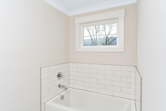 bathroom with a tub to relax in