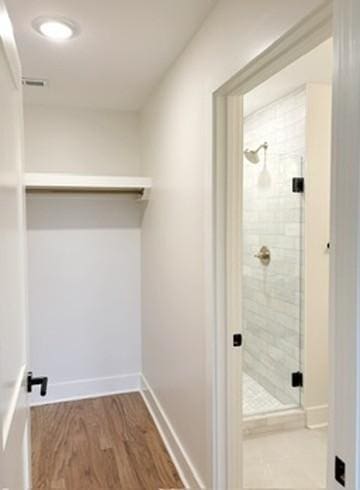 laundry room featuring hardwood / wood-style floors