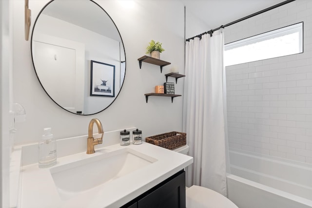 full bathroom featuring shower / tub combo with curtain, vanity, and toilet