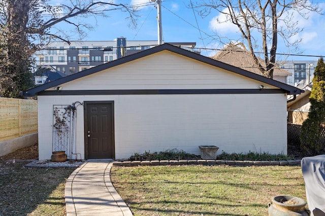 view of side of property with a yard