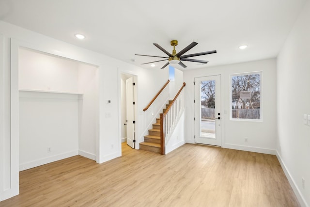 interior space featuring light hardwood / wood-style flooring and ceiling fan