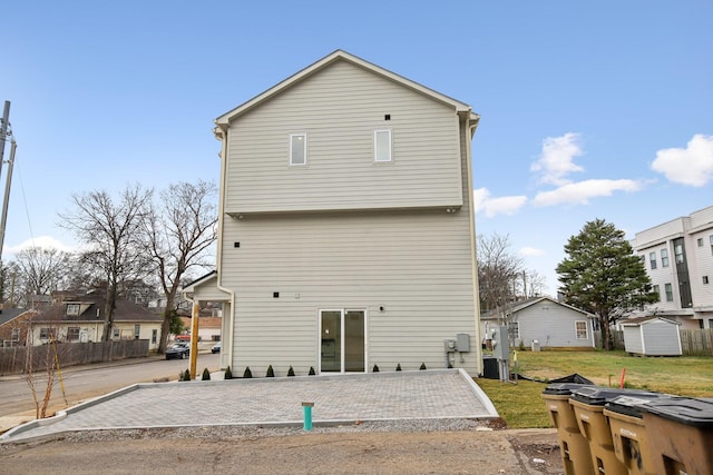 back of property with a patio area