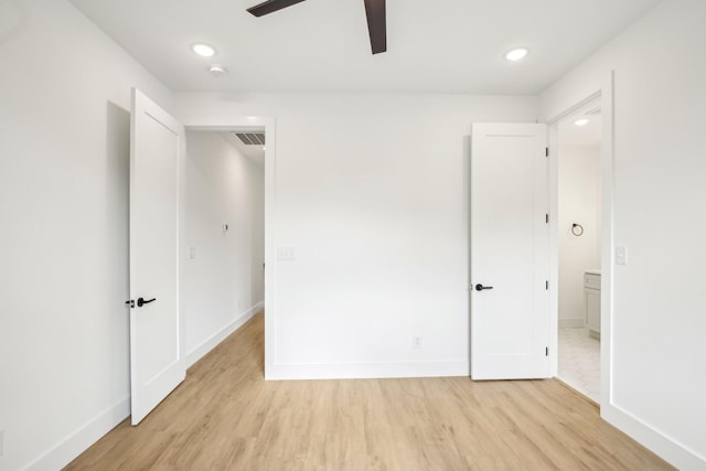 unfurnished bedroom featuring ceiling fan and light hardwood / wood-style flooring