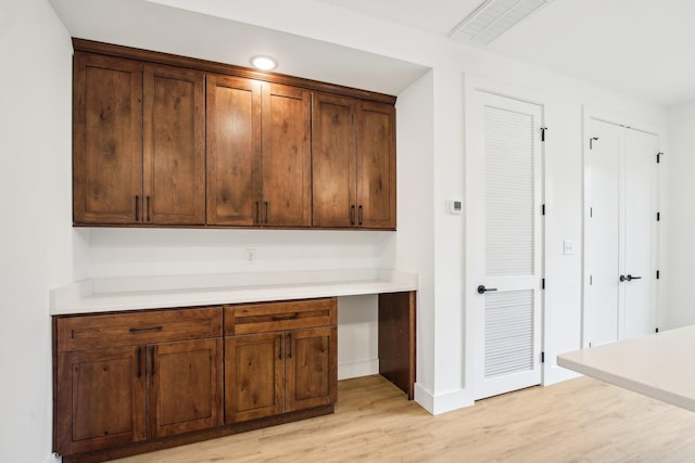 kitchen with light hardwood / wood-style flooring