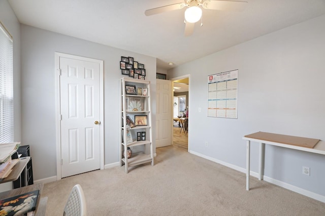 miscellaneous room with light carpet and ceiling fan