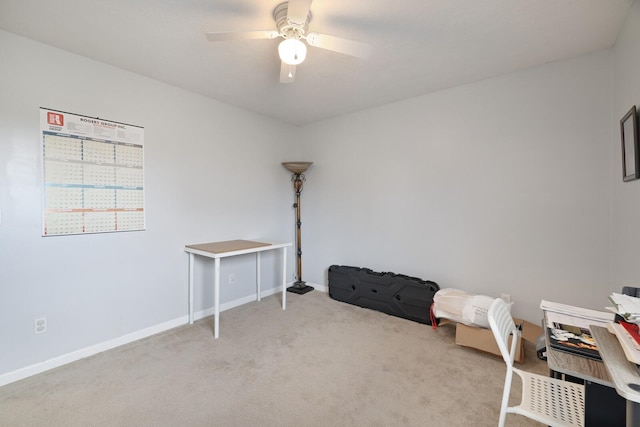 misc room with light carpet and ceiling fan