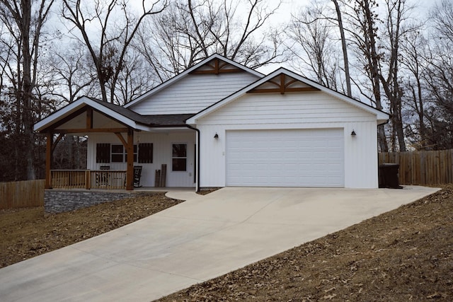 view of front facade featuring a garage and a porch