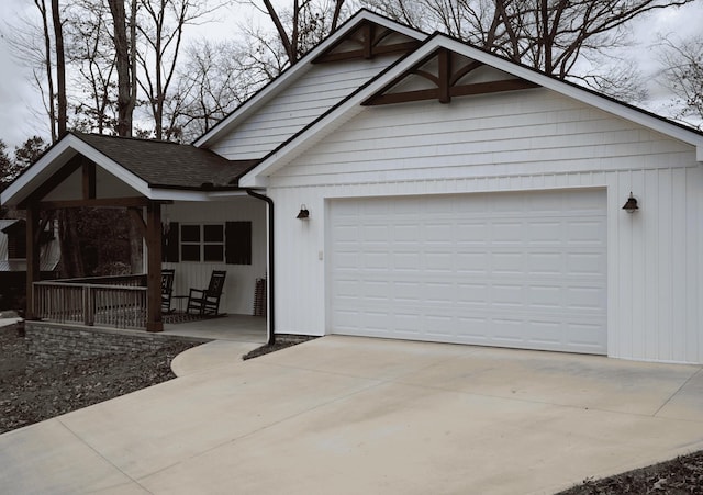 view of front of home with a garage and covered porch