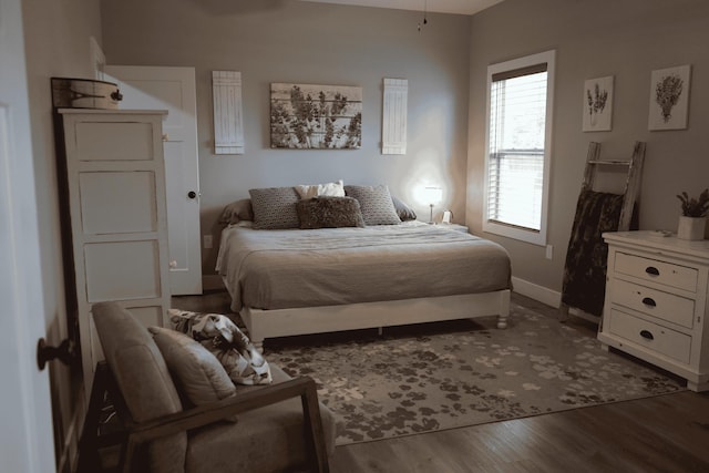 bedroom featuring dark hardwood / wood-style floors