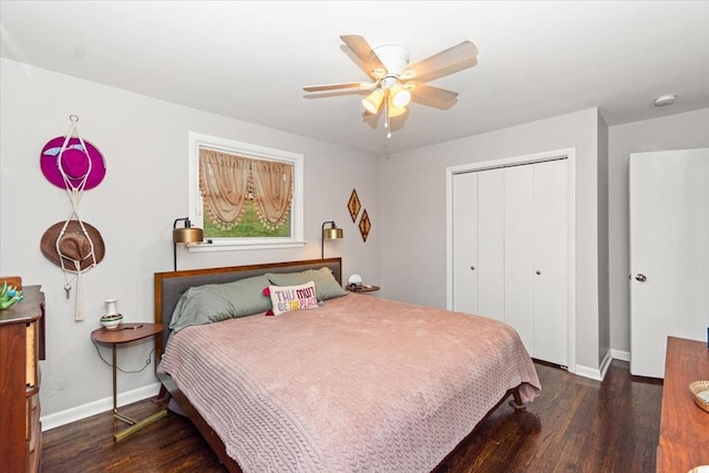 bedroom with ceiling fan, dark hardwood / wood-style flooring, and a closet