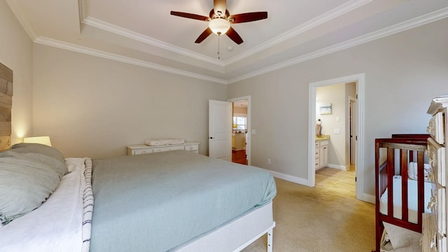 carpeted bedroom featuring a raised ceiling, ornamental molding, and ceiling fan