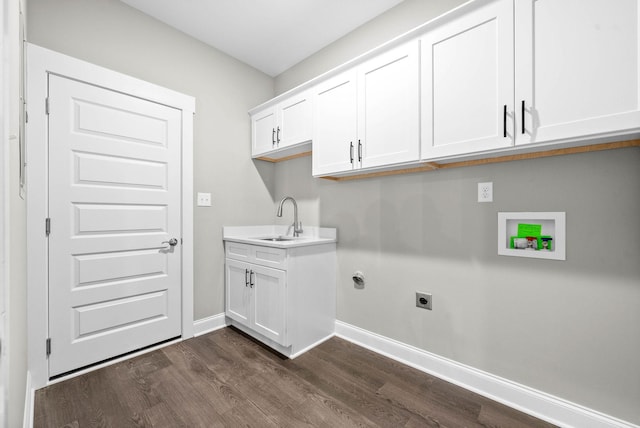 laundry room featuring dark hardwood / wood-style floors, sink, cabinets, washer hookup, and hookup for an electric dryer