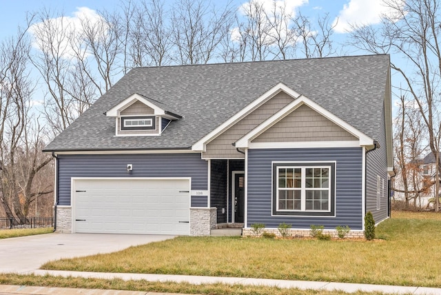 craftsman-style house with a garage and a front yard