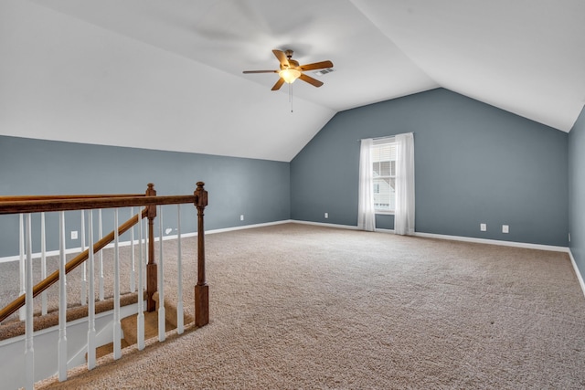 additional living space featuring ceiling fan, carpet floors, and lofted ceiling