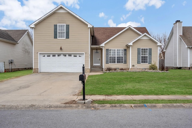 front of property featuring a front yard and a garage