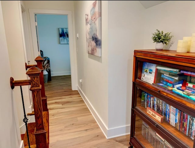 corridor featuring light hardwood / wood-style floors