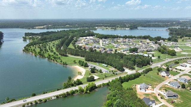 bird's eye view featuring a water view and a residential view