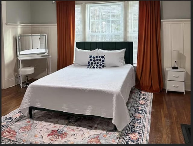 bedroom featuring dark hardwood / wood-style floors