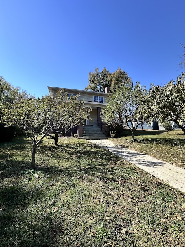 view of front of house with a front yard