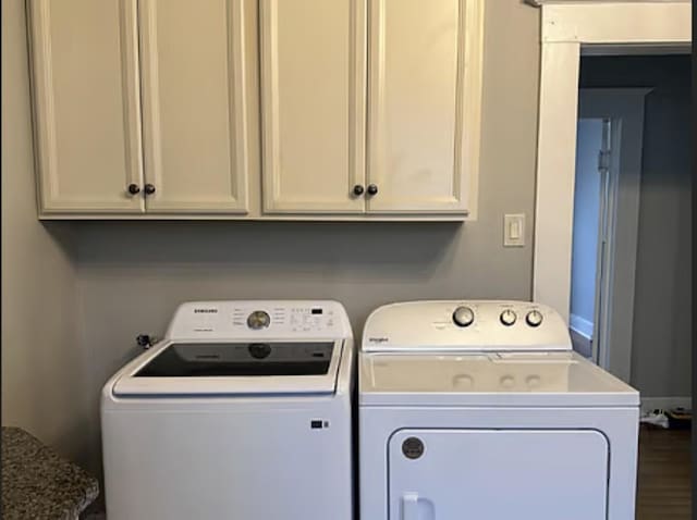 clothes washing area featuring washing machine and clothes dryer