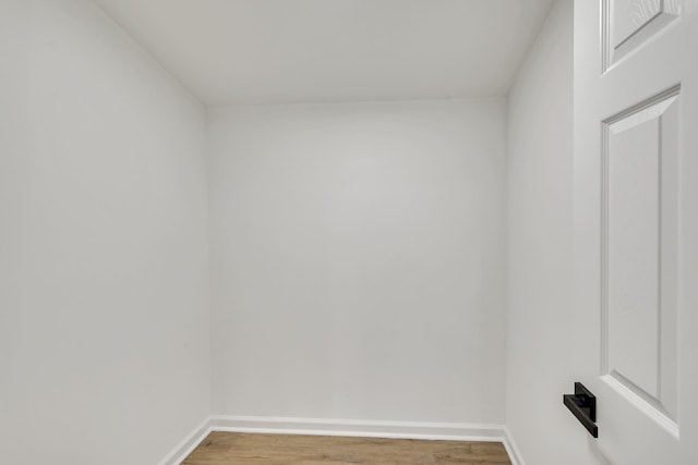 unfurnished room with hardwood / wood-style floors