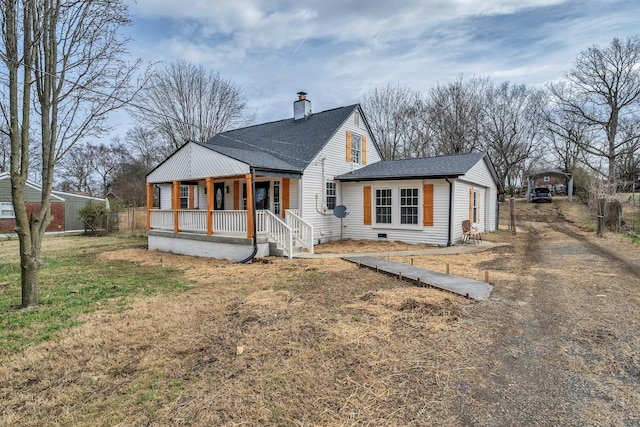 view of front of house featuring a front yard and covered porch