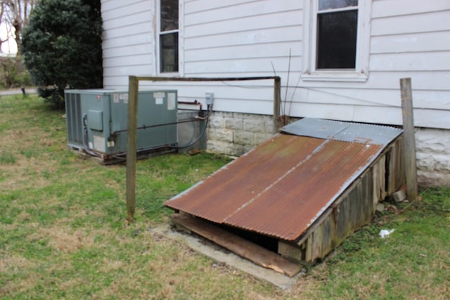 exterior details featuring a power unit, central AC, and a bulkhead entry