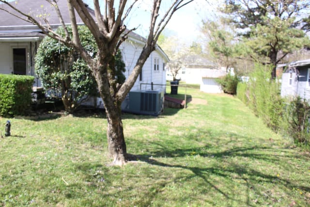 view of yard featuring central AC