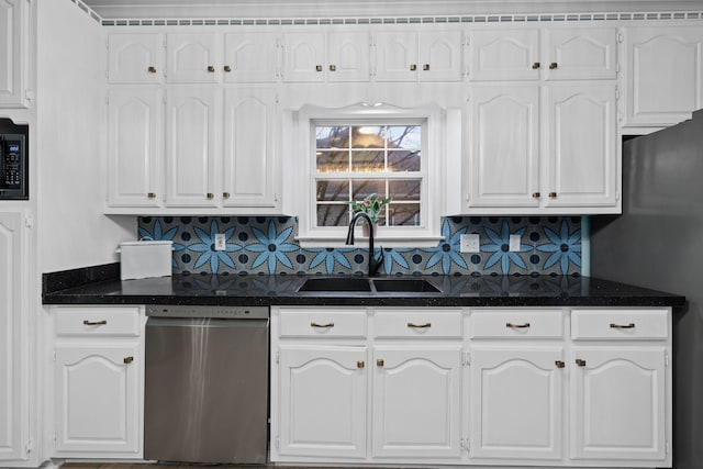 kitchen featuring sink, backsplash, stainless steel dishwasher, and white cabinets