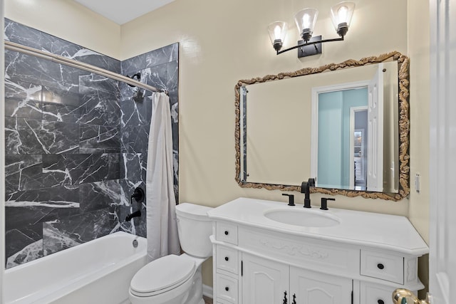 full bathroom with shower / tub combo with curtain, vanity, and toilet