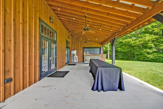 view of patio / terrace featuring french doors and ceiling fan