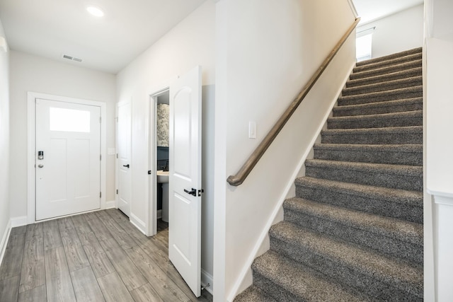 foyer with light wood-type flooring