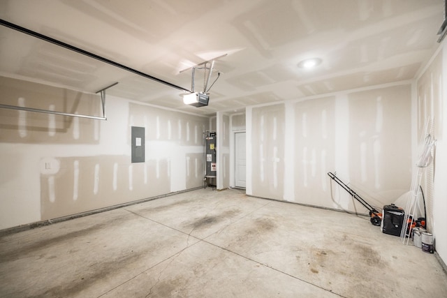 garage with a garage door opener, electric water heater, and electric panel