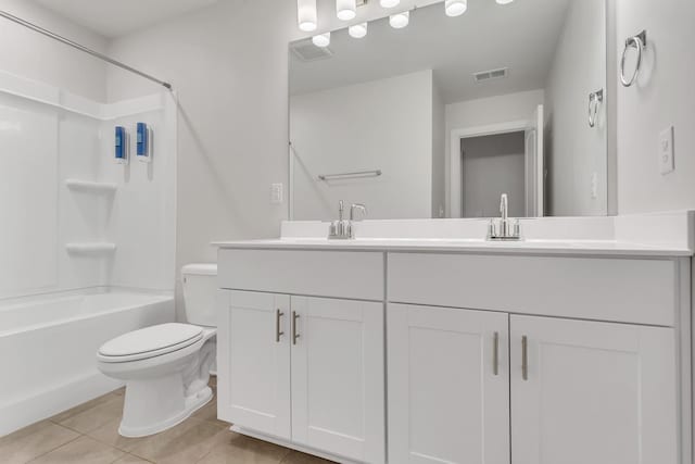 full bathroom with shower / washtub combination, toilet, tile patterned floors, and vanity