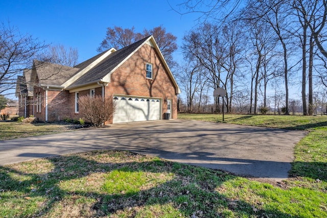 view of side of property featuring a garage