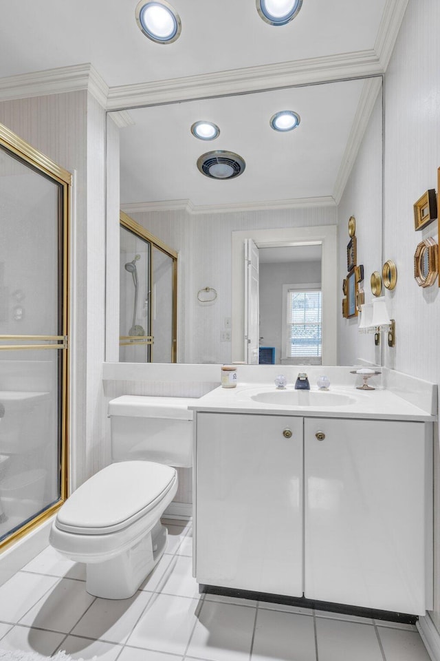 bathroom with vanity, a shower with shower door, ornamental molding, and toilet