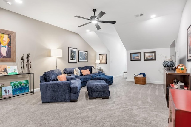 living room featuring carpet floors, ceiling fan, and vaulted ceiling