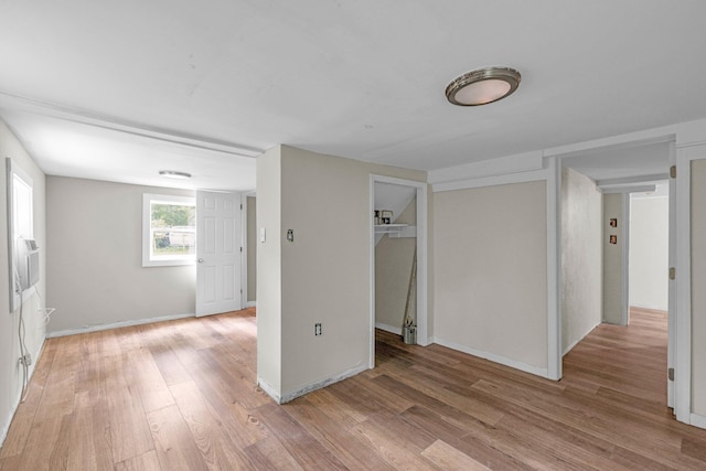 interior space featuring light hardwood / wood-style floors and a closet