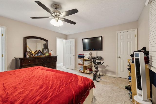 bedroom with light colored carpet and ceiling fan